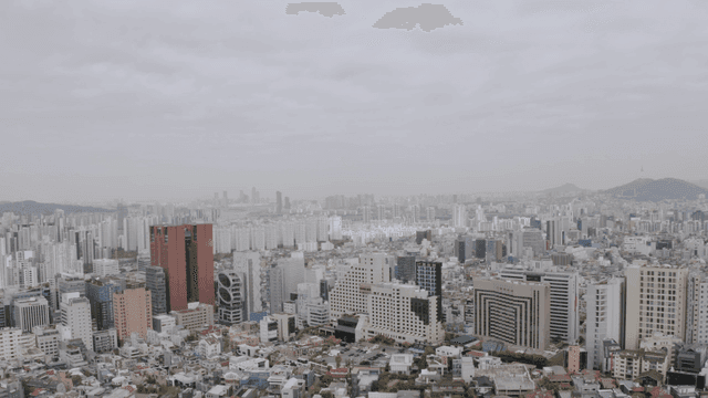 Cityscape under cloudy sky