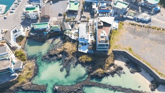 Coastal town with clear turquoise waters