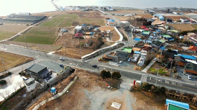 Quiet rural village near water with scattered houses