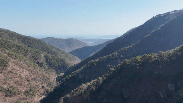 A vast mountain range under a clear sky