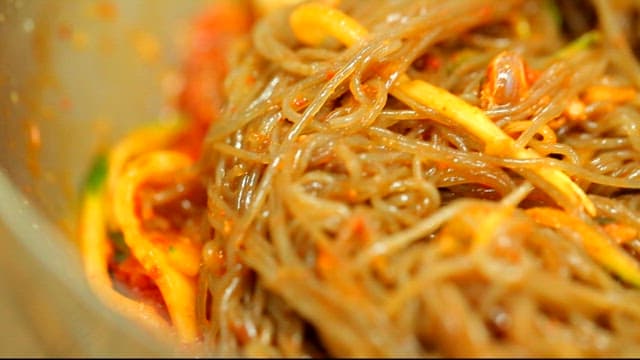 Close-up of cold buckwheat noodles with raw pollack with toppings