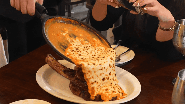 Restaurant that pours cheese sauce over steak