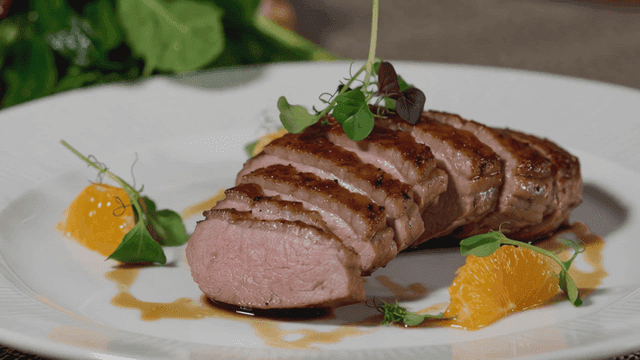 Duck breast steak on plate