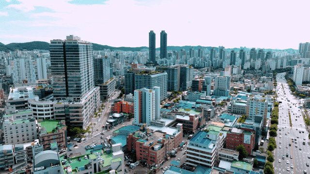 Bustling city with tall skyscrapers