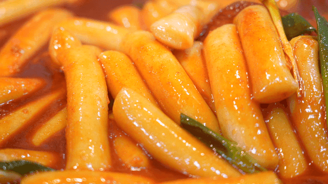 Spicy tteokbokki simmering in sauce