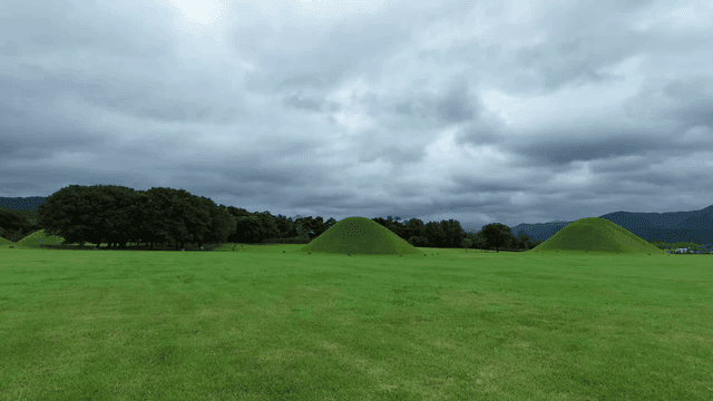 Green Daereungwon under cloudy sky