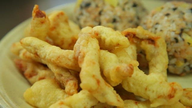 Fried squid with sauce and rice balls