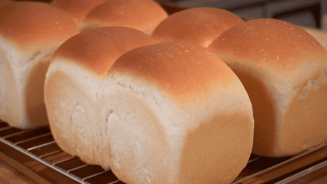 Freshly baked bread cooling on a rack