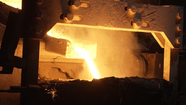 Molten metal pouring in a foundry