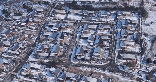 Snow-covered traditional Hanok village