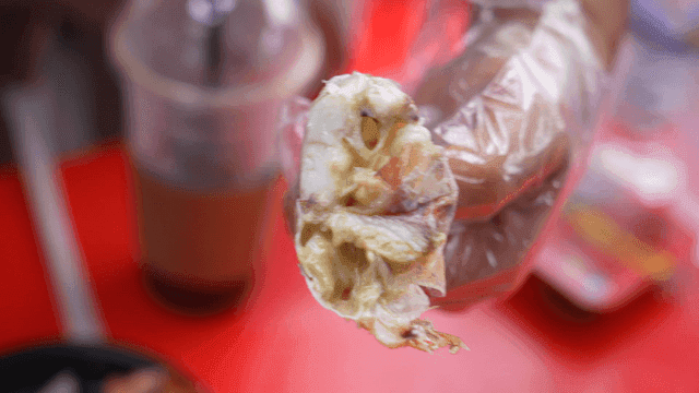 Boiled crab cut with scissors showing cross-section