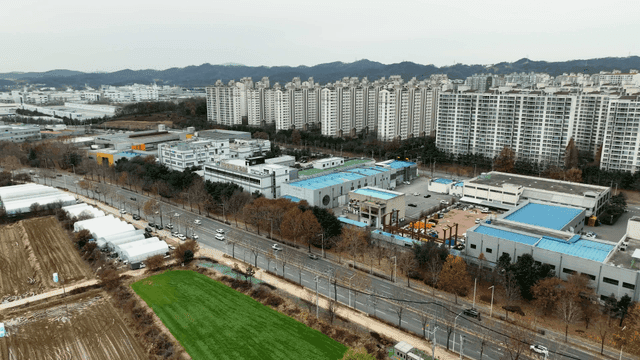 Cityscape with high-rise apartments and industrial buildings
