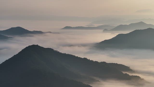 Misty Mountain Peaks at Dawn