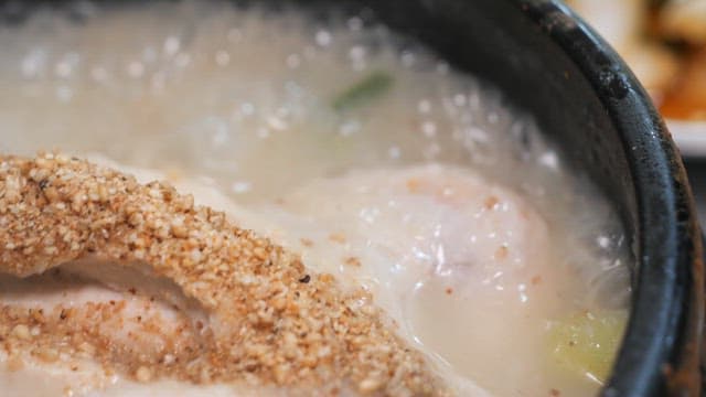 Boiling Samgyetang with Sesame Seeds