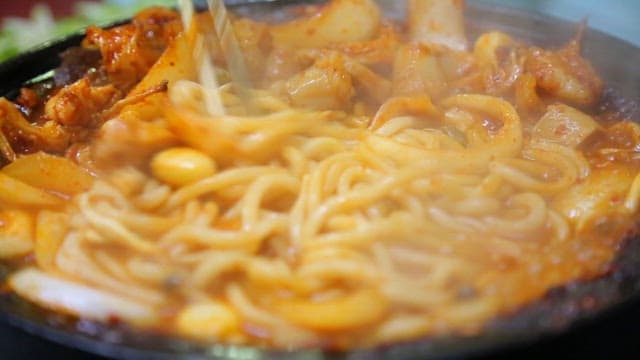 Grilled marinated beef tripe with udon noodles