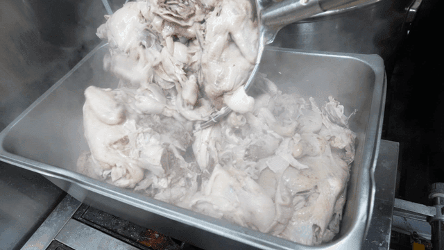Boiled chicken taken out of kitchen