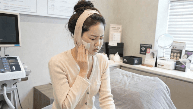 Female patient with bandage in clinic room