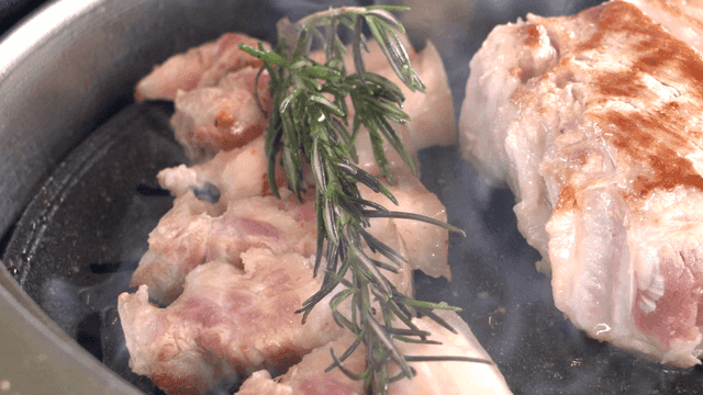 Grilling pork belly with herbs