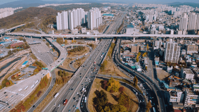 A bustling city with highways and skyscrapers