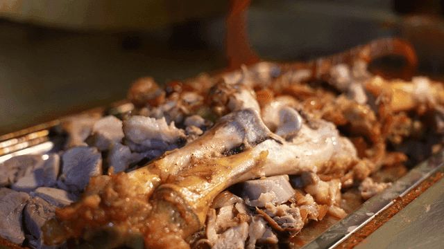 Jokbal with sauce drizzled over it