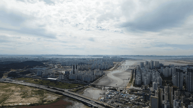 Panoramic view of city with flowing river