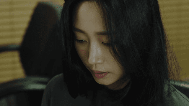 Office woman with dark expression
