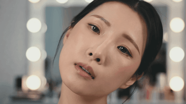 Woman who had her makeup done at beauty studio