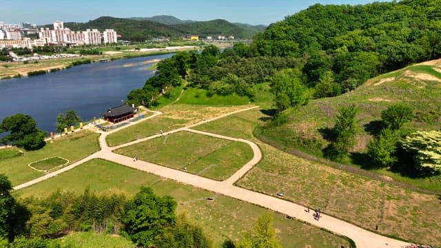 Scenic riverside park with a traditional pavilion