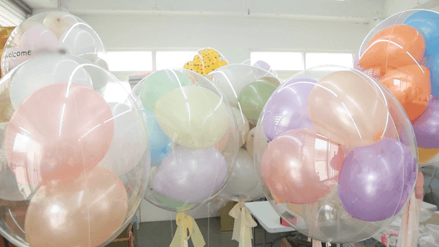 Colorful balloons in a bright room