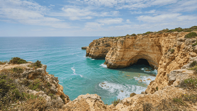 Rocky cliffs and clear blue sea