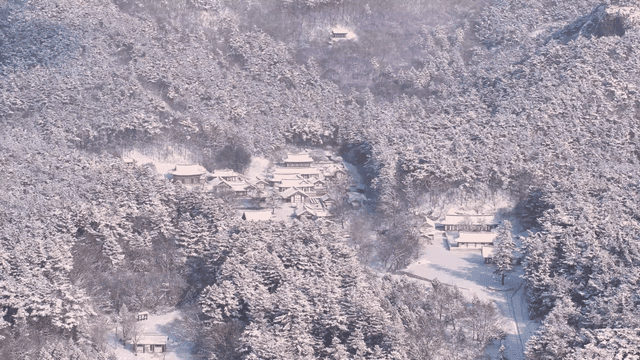 Snow-covered traditional Hanok village