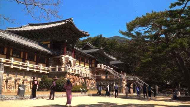 People touring the ancient temple Bulguksa on a clear day