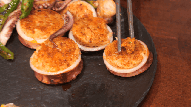 Chopsticks for eating squid sundae topped with ssamjang