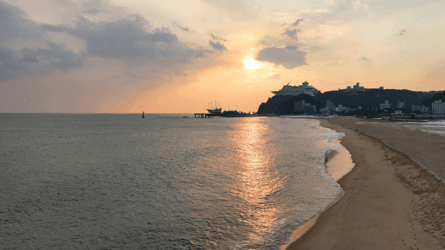 Quiet beach with view of sunset