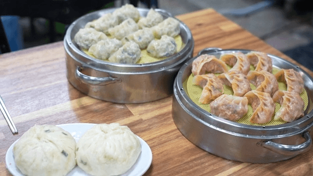 Various types of dumplings on a table