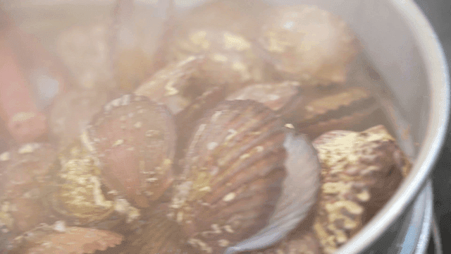 Seafood boiling in a pot