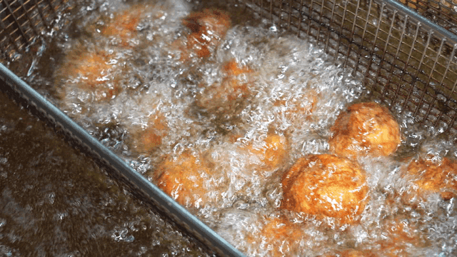 Chicken skin dumplings fried in hot oil