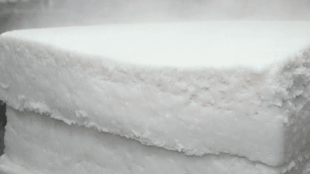 Steaming rice cake in a kitchen