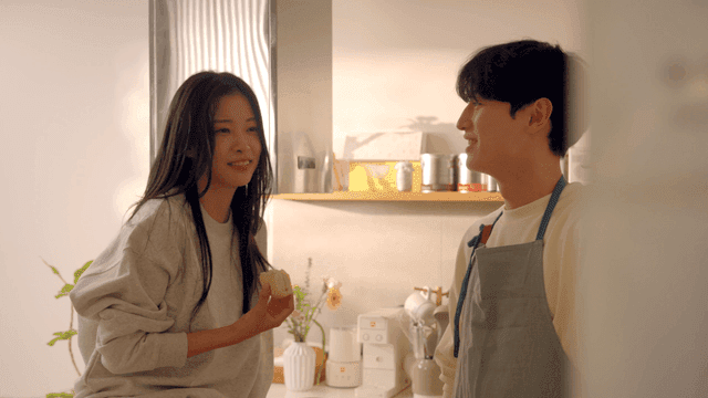 Couple spending time together in kitchen