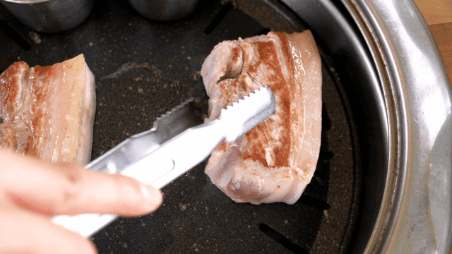 Grilling pork belly with rosemary