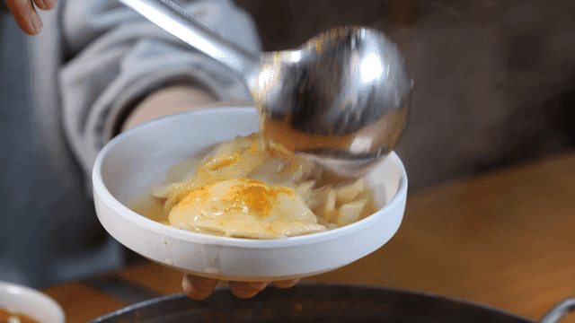 Hot dumpling hot pot served on white plate