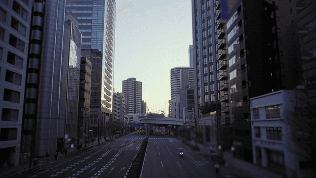 Bustling city street with tall buildings