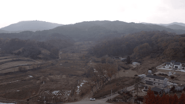Countryside scenery with farms and hills