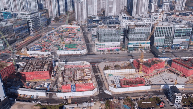 Urban construction site with cranes