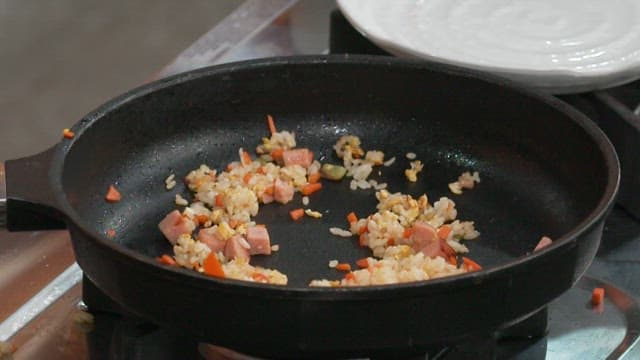 Cooking Ham Omelet Fried Rice with Vibrant Vegetables