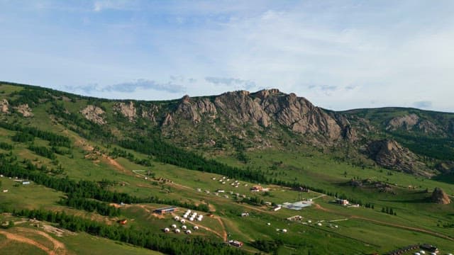 Vast landscape with mountains and fields