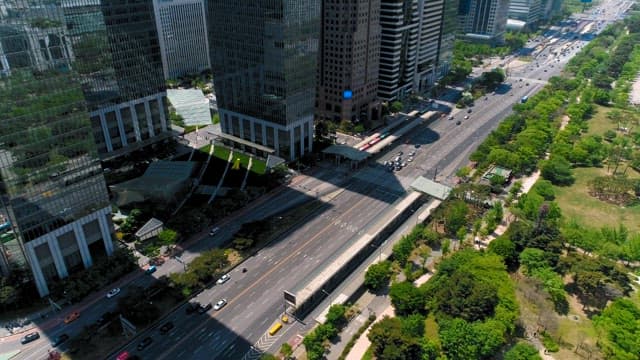 Boulevard Between City Skyscrapers and Park