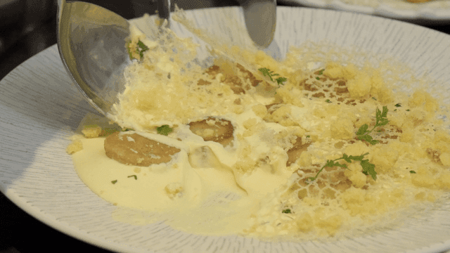Creamy Gnocchi Dish Prepared with Spoon