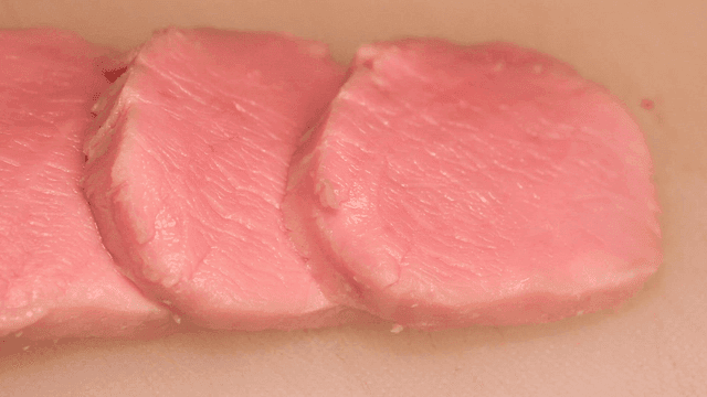 Fresh sous vide sirloin slices on cutting board