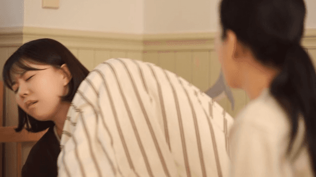 Nagging mother and daughter getting into bed